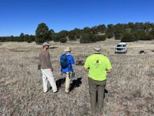 Geologists at work prepping drone for take off